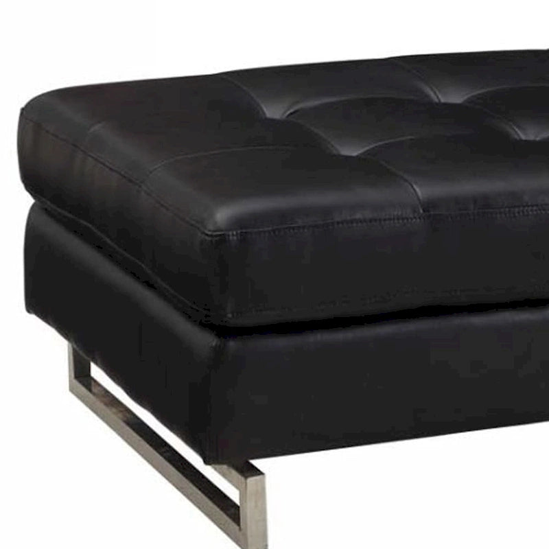 Large Black Tufted Faux Leather Ottoman with Silver Metal Sled Base